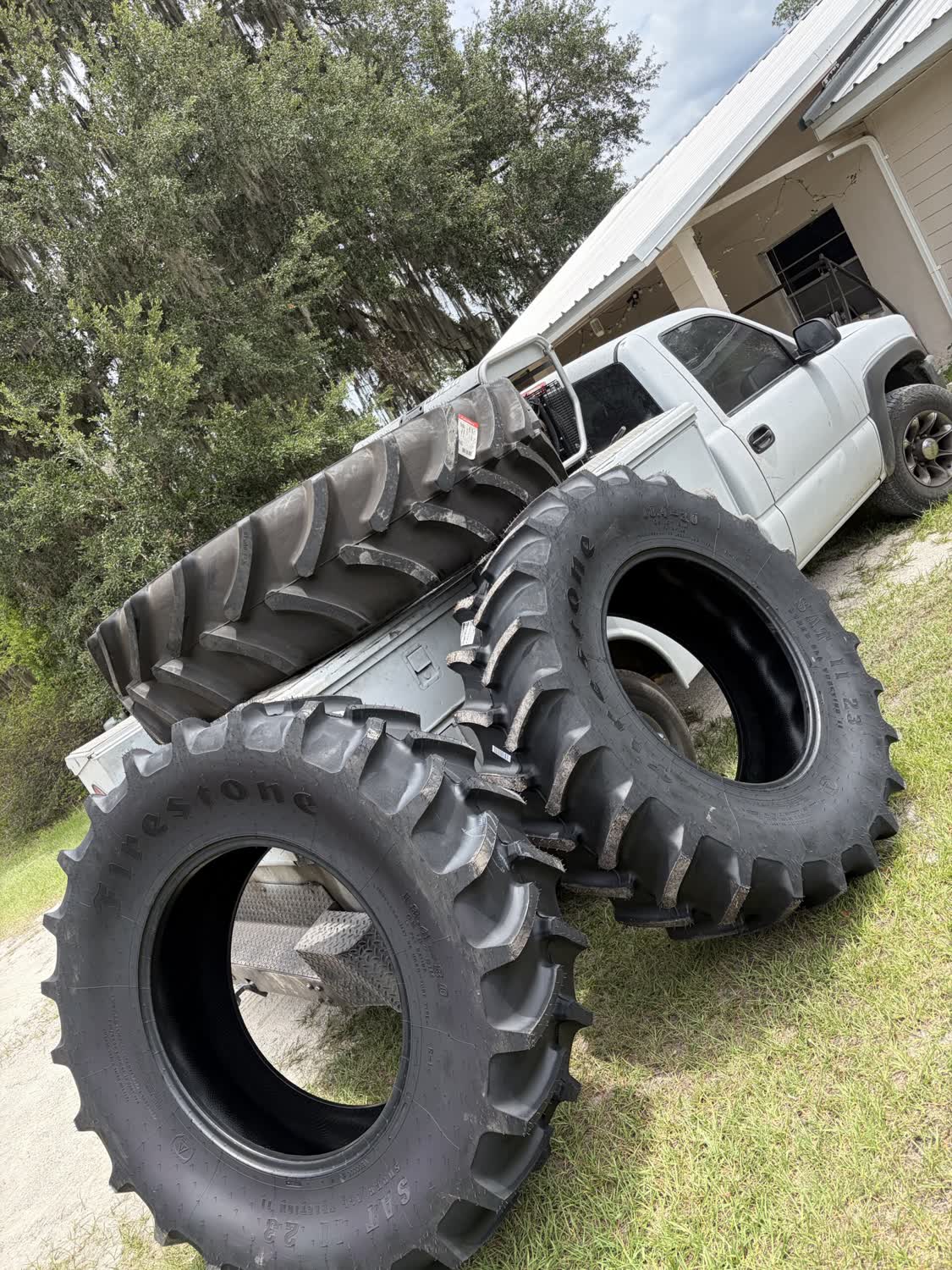 New Firestone tractor tires loaded for farm delivery near Chiefland FL