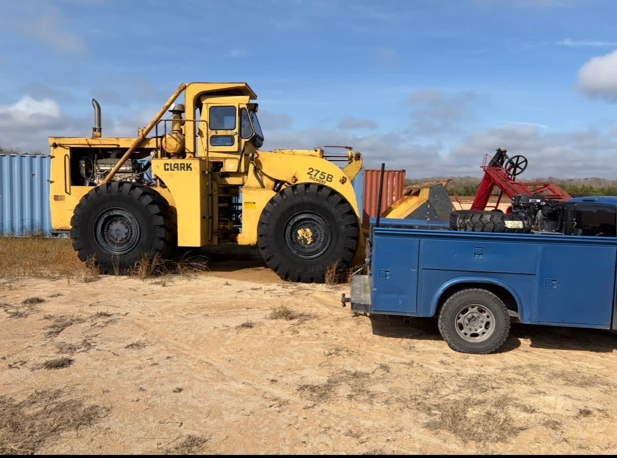 Clark 275B wheel loader tire service with mobile service truck