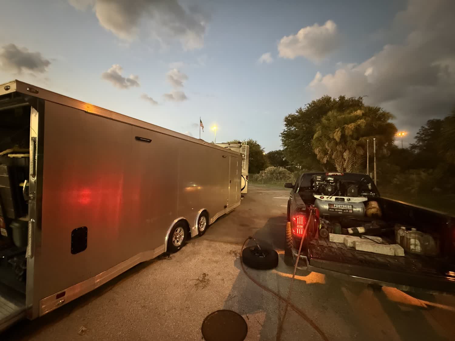 Night-time emergency trailer tire service on the roadside