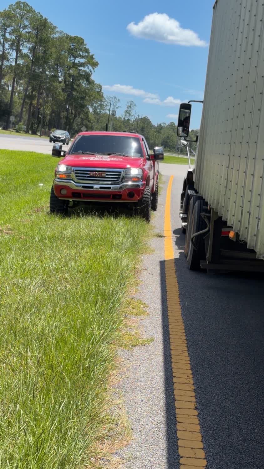 24-7 roadside semi-truck tire service on the highway shoulder near Gainesville FL